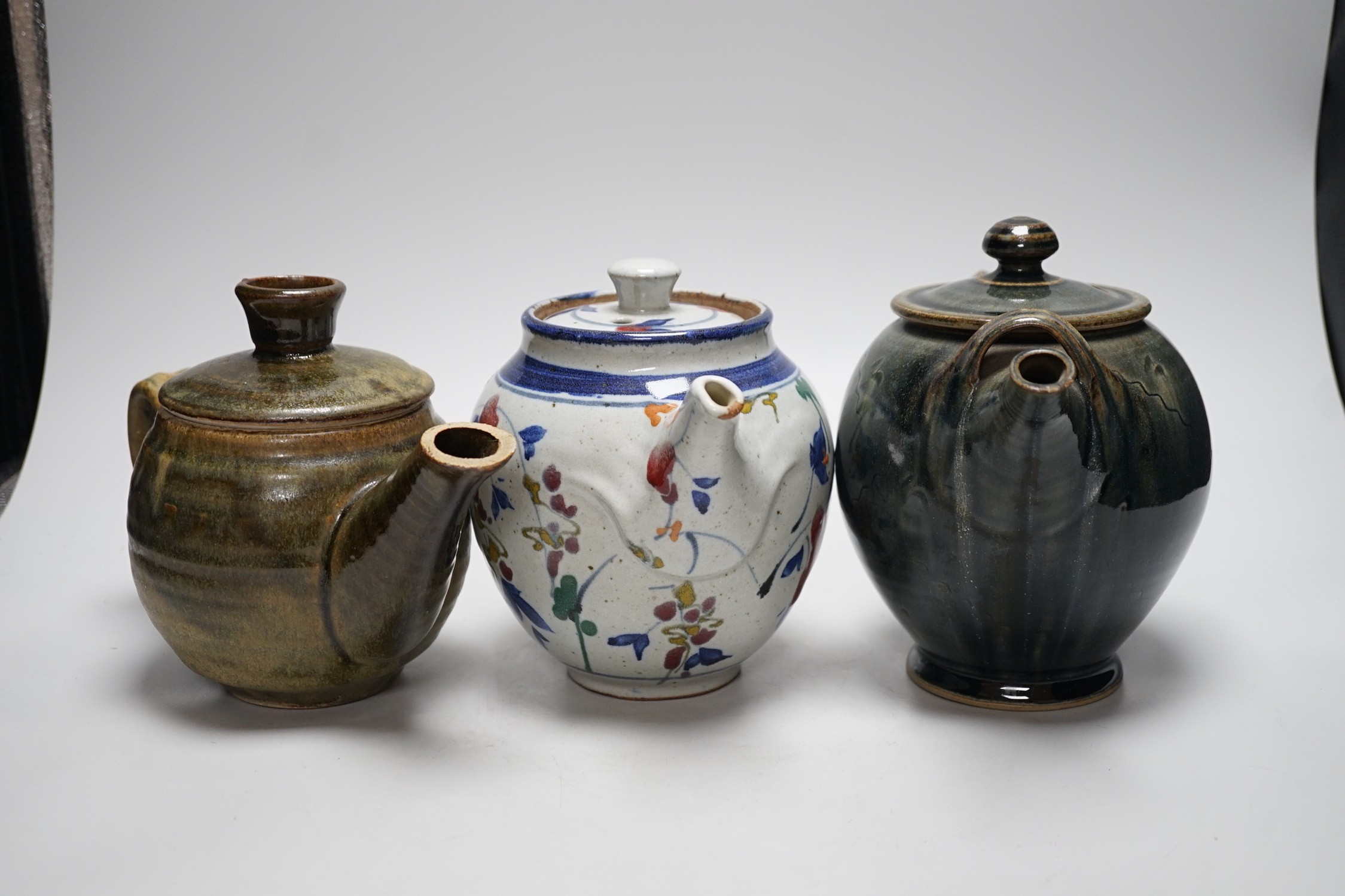 Three studio pottery teapots, 18cm